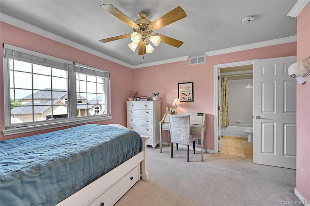 14878 E Aberdeen Ave, Centennial, CO 80016 - bedroom featuring multiple windows, crown molding, light colored carpet, baseboards, and ensuite bathroom