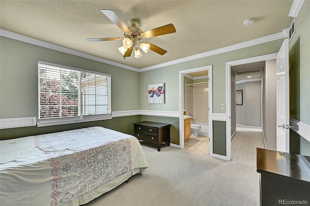 14878 E Aberdeen Ave, Centennial, CO 80016 - bedroom with ornamental molding, light colored carpet, a ceiling fan, a textured ceiling, and ensuite bathroom