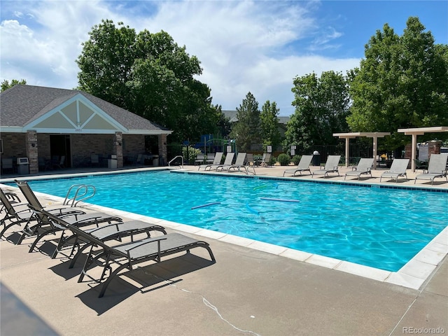 14878 E Aberdeen Ave, Centennial, CO 80016 - community pool featuring a patio area