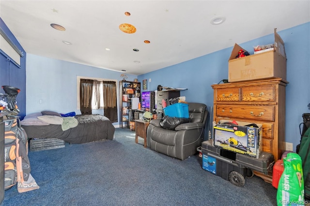 bedroom featuring carpet