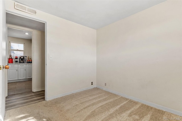 view of carpeted spare room