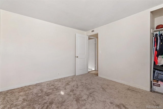 unfurnished bedroom featuring carpet flooring