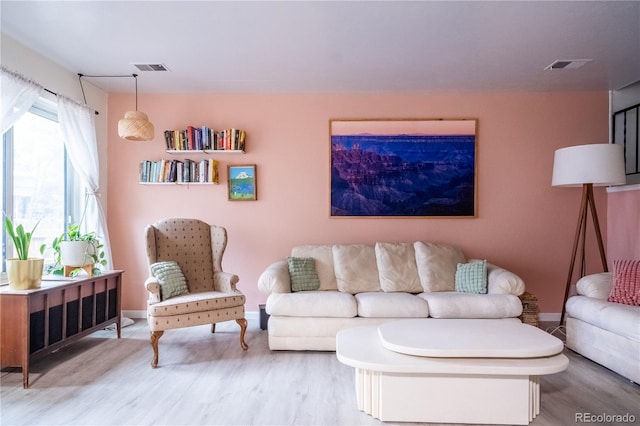 2557 S Dover St Unit 85, Lakewood, CO 80227 - living area with wood finished floors and baseboards