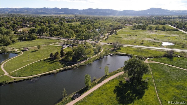 2557 S Dover St Unit 85, Lakewood, CO 80227 - aerial overview of property's location with a water and mountain view