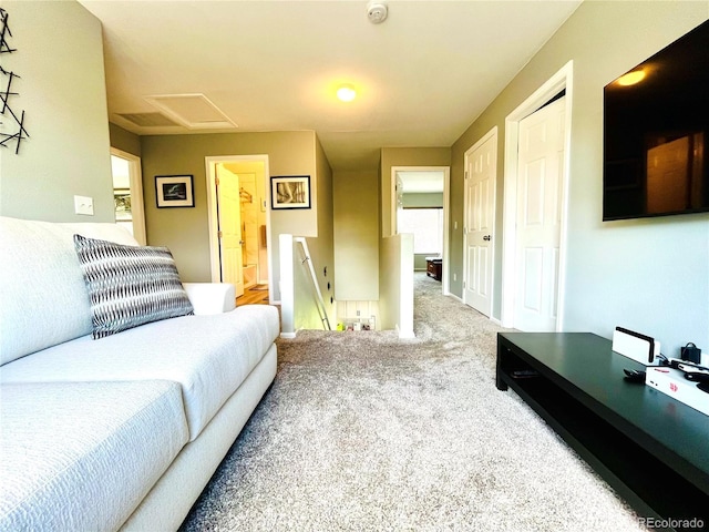 15353 E 98th Pl, Commerce City, CO 80022 - carpeted living room featuring attic access