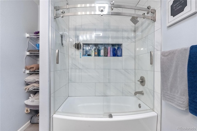 15353 E 98th Pl, Commerce City, CO 80022 - bathroom featuring shower / bath combination with glass door