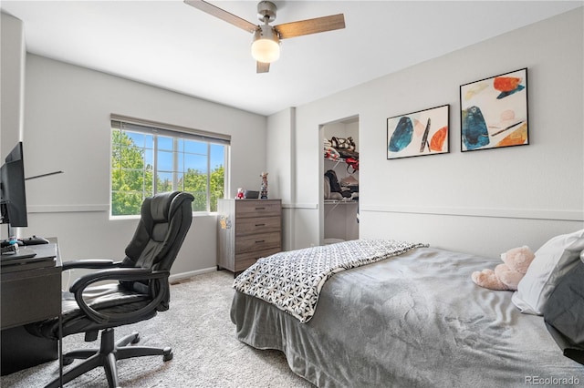 15353 E 98th Pl, Commerce City, CO 80022 - bedroom featuring carpet flooring, a desk, ceiling fan, and a walk in closet