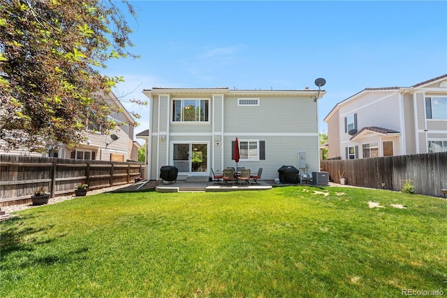15353 E 98th Pl, Commerce City, CO 80022 - back of house featuring a fenced backyard and a patio area