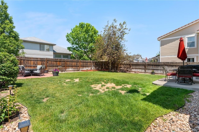 15353 E 98th Pl, Commerce City, CO 80022 - fenced backyard with a patio