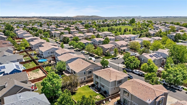 15353 E 98th Pl, Commerce City, CO 80022 - aerial perspective of suburban area with a mountainous background