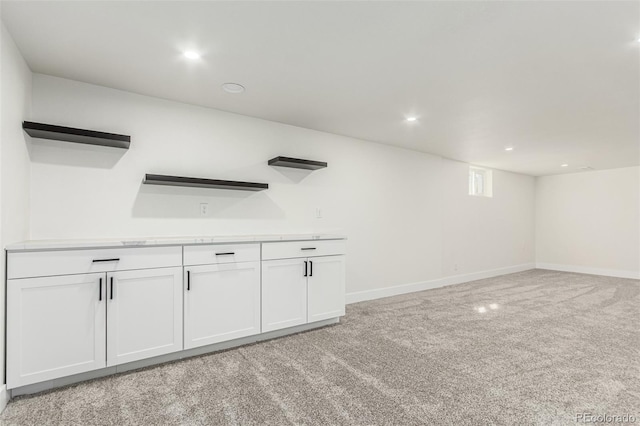 bar with light carpet, baseboards, and recessed lighting