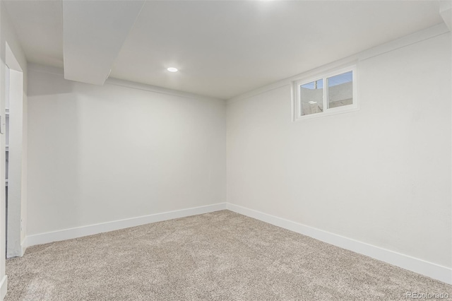 finished below grade area featuring carpet floors, baseboards, and recessed lighting