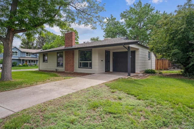 1420 S Leyden St, Denver, CO 80224 - ranch-style home featuring a chimney, a garage, and concrete driveway
