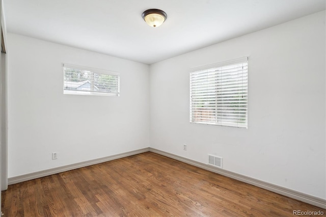 1420 S Leyden St, Denver, CO 80224 - empty room with wood finished floors and baseboards