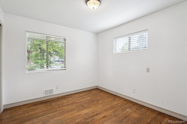 1420 S Leyden St, Denver, CO 80224 - unfurnished room with wood finished floors and baseboards