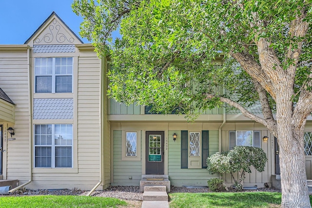 multi unit property featuring a porch