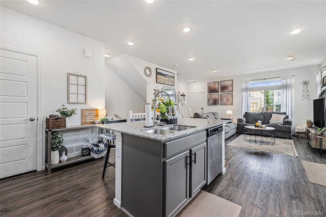 20000 E 40th Ave Unit 4, Denver, CO 80249 - kitchen with dishwasher, dark wood-style floors, a sink, recessed lighting, and open floor plan