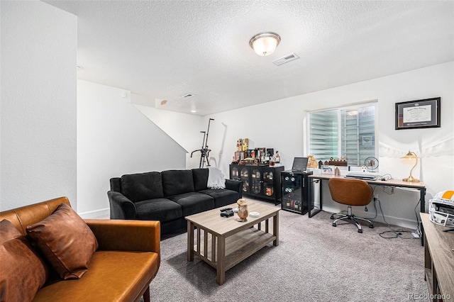 20000 E 40th Ave Unit 4, Denver, CO 80249 - carpeted living area with a textured ceiling and an office area