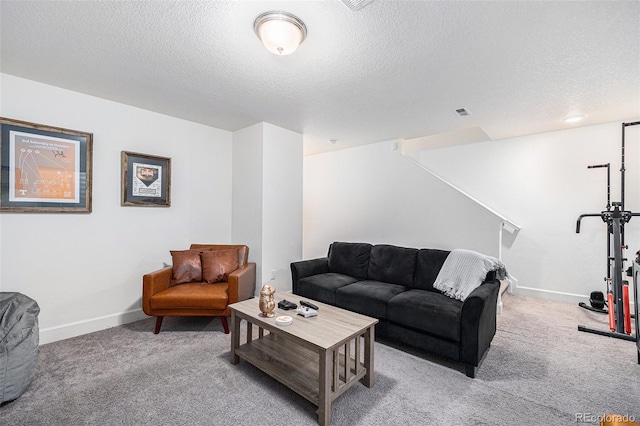 20000 E 40th Ave Unit 4, Denver, CO 80249 - carpeted living area featuring a textured ceiling, baseboards, and stairway