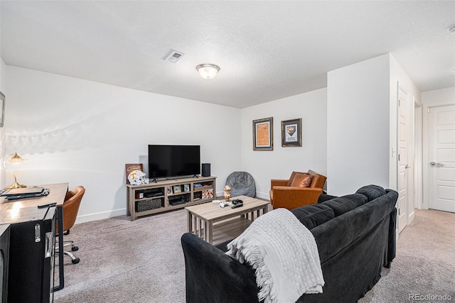 20000 E 40th Ave Unit 4, Denver, CO 80249 - living area featuring light carpet, baseboards, and a textured ceiling