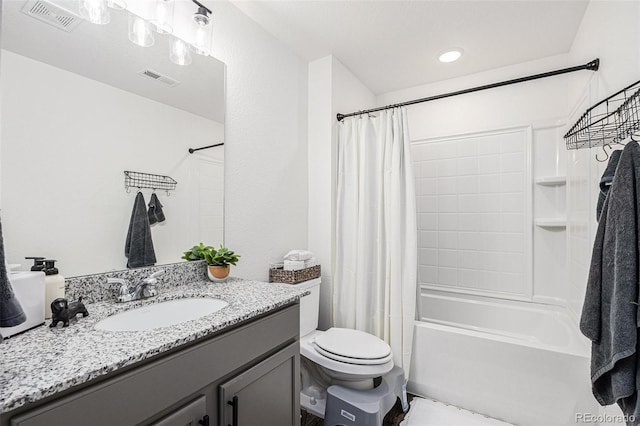20000 E 40th Ave Unit 4, Denver, CO 80249 - bathroom featuring vanity, shower / bath combination with curtain, and toilet