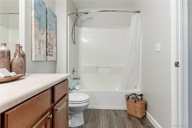 full bathroom featuring hardwood / wood-style flooring, vanity, shower / bathtub combination with curtain, and toilet