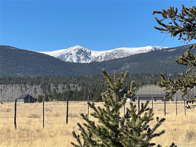 view of mountain feature with a rural view