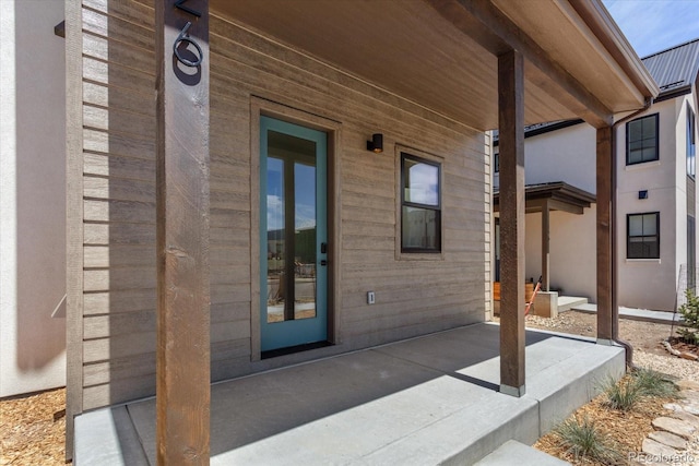126 Chase St, Salida, CO 81201 - view of exterior entry featuring covered porch