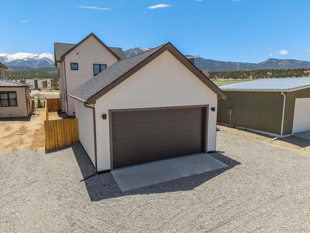 126 Chase St, Salida, CO 81201 - view of front of property with a mountain view, stucco siding, and fence