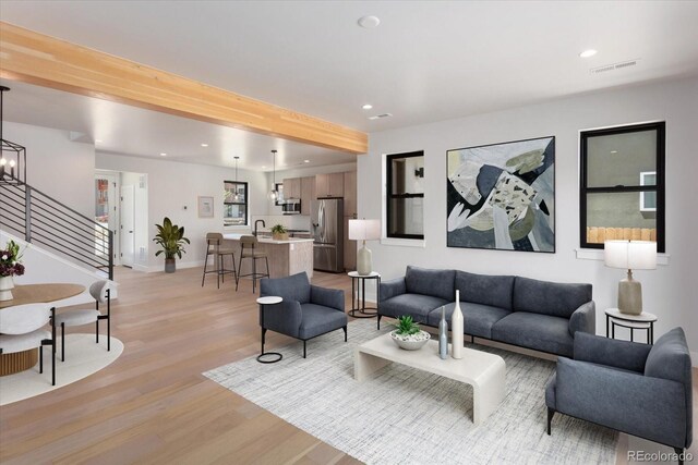 126 Chase St, Salida, CO 81201 - living area with light wood-style flooring, stairs, recessed lighting, and baseboards
