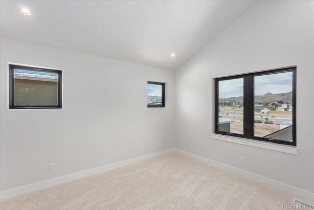 126 Chase St, Salida, CO 81201 - spare room featuring lofted ceiling, carpet flooring, baseboards, and recessed lighting