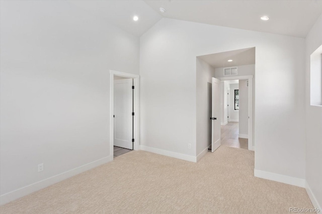 126 Chase St, Salida, CO 81201 - spare room with carpet, baseboards, recessed lighting, and high vaulted ceiling
