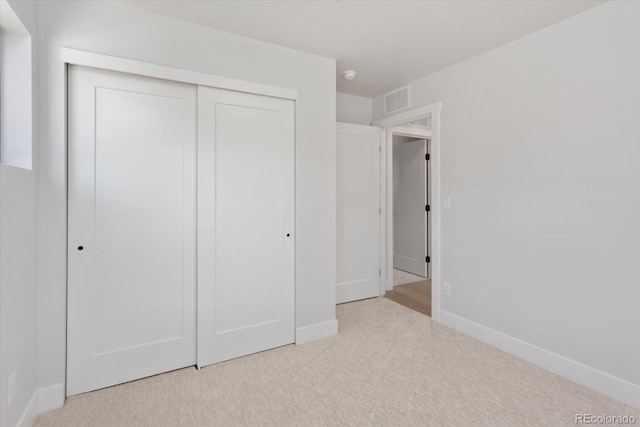 126 Chase St, Salida, CO 81201 - unfurnished bedroom with carpet, a closet, and baseboards
