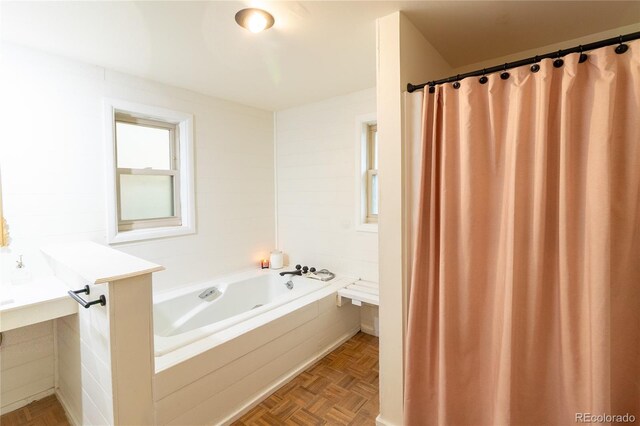 2795 SE Grapevine Rd, Idledale, CO 80453 - full bath featuring plenty of natural light and a bath