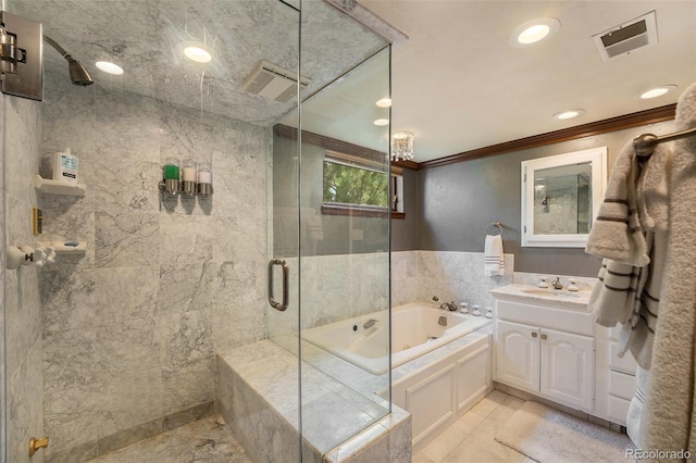 bathroom with ornamental molding, separate shower and tub, and vanity