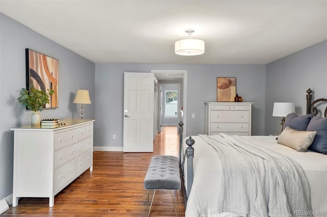 8140 S Storm King Peak, Littleton, CO 80127 - bedroom with wood finished floors and baseboards