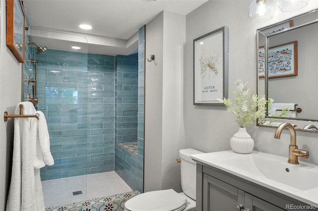8140 S Storm King Peak, Littleton, CO 80127 - full bath featuring toilet, vanity, and tiled shower