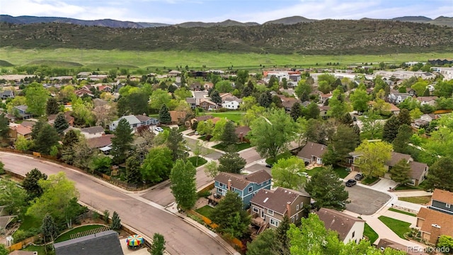 8140 S Storm King Peak, Littleton, CO 80127 - aerial view of residential area with a mountain backdrop