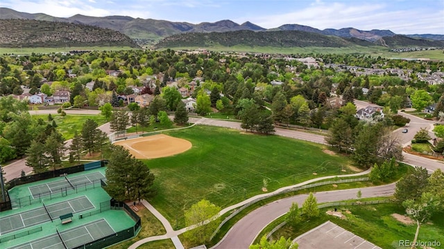 8140 S Storm King Peak, Littleton, CO 80127 - aerial perspective of suburban area featuring a mountain backdrop