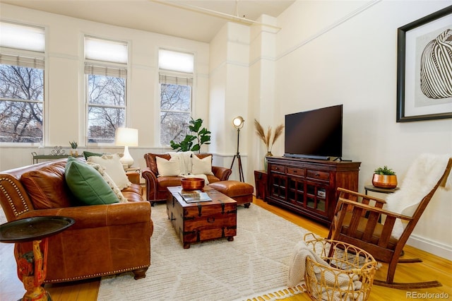 1140 Columbine St Unit 302, Denver, CO 80206 - living area featuring wood finished floors
