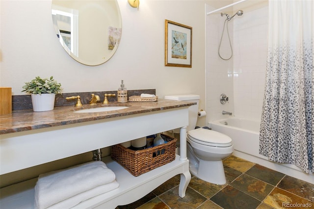 1140 Columbine St Unit 302, Denver, CO 80206 - full bath featuring shower / bath combo, vanity, and stone finish flooring