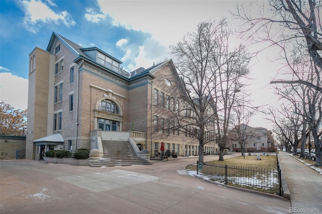 1140 Columbine St Unit 302, Denver, CO 80206 - view of property featuring stairway