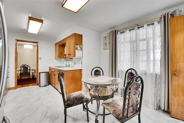 4705 Upham St, Wheat Ridge, CO 80033 - dining space with light marble finish floors
