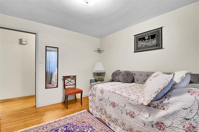 4705 Upham St, Wheat Ridge, CO 80033 - bedroom featuring wood finished floors and baseboards
