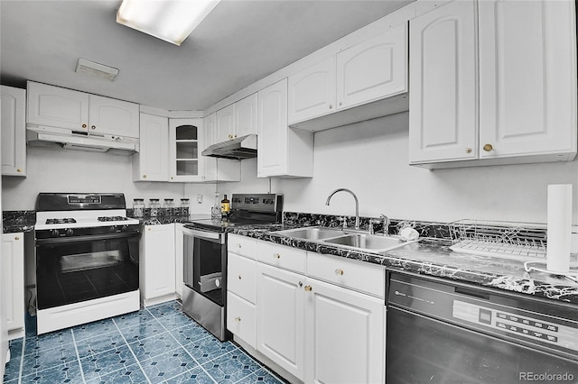 4705 Upham St, Wheat Ridge, CO 80033 - kitchen with white gas stove, stainless steel electric stove, under cabinet range hood, and dishwasher