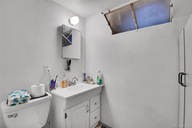 4705 Upham St, Wheat Ridge, CO 80033 - bathroom featuring vanity and toilet
