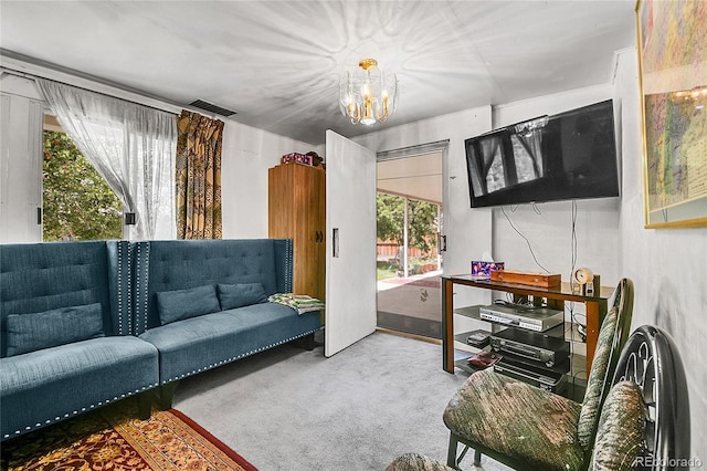4705 Upham St, Wheat Ridge, CO 80033 - carpeted living area featuring a chandelier