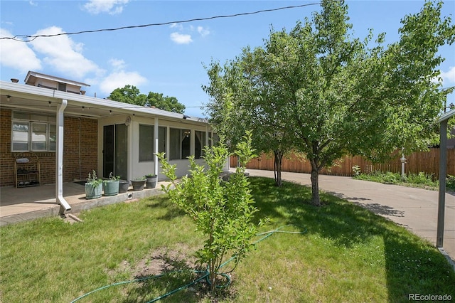 4705 Upham St, Wheat Ridge, CO 80033 - view of yard with a sunroom
