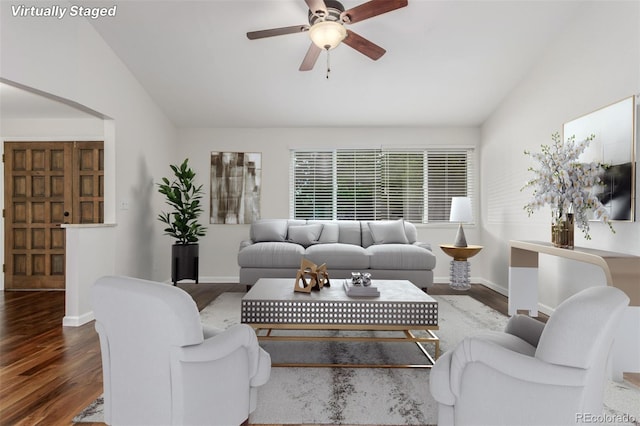5890 W Quarles Dr, Littleton, CO 80128 - living room featuring lofted ceiling, wood finished floors, a ceiling fan, and baseboards