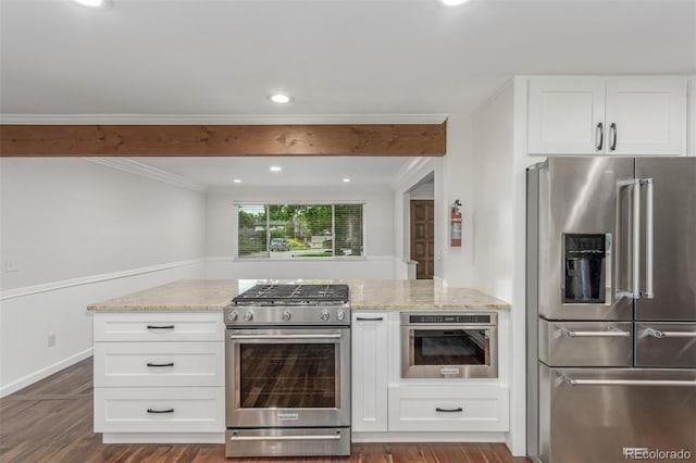 5890 W Quarles Dr, Littleton, CO 80128 - kitchen featuring appliances with stainless steel finishes, light stone countertops, white cabinetry, ornamental molding, and dark wood-type flooring